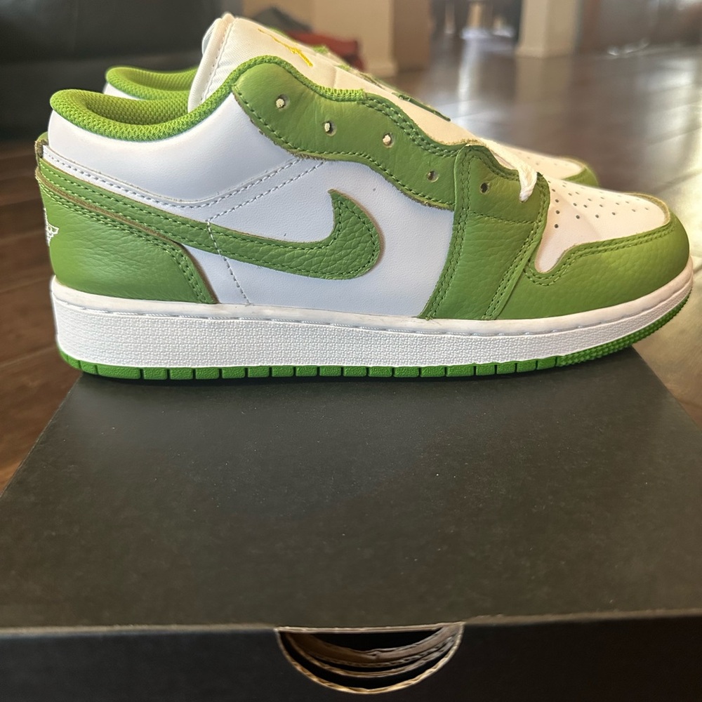 Brand new Air Jordan one low SE BG. Size 6 youth.